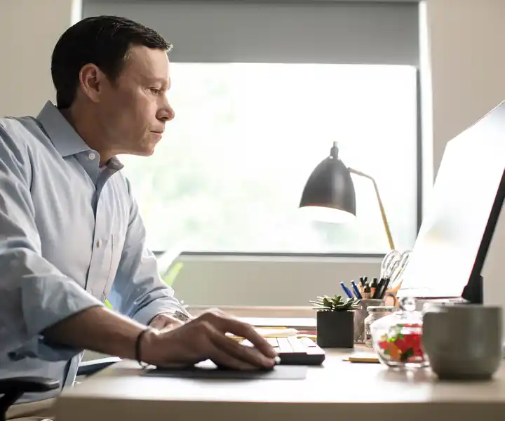 Man working on his desktop computer
SERV1444 Three Year usage. Limited to Internal use at corporate on digital, social and website, with three yea print usage beginning 10/1/2021