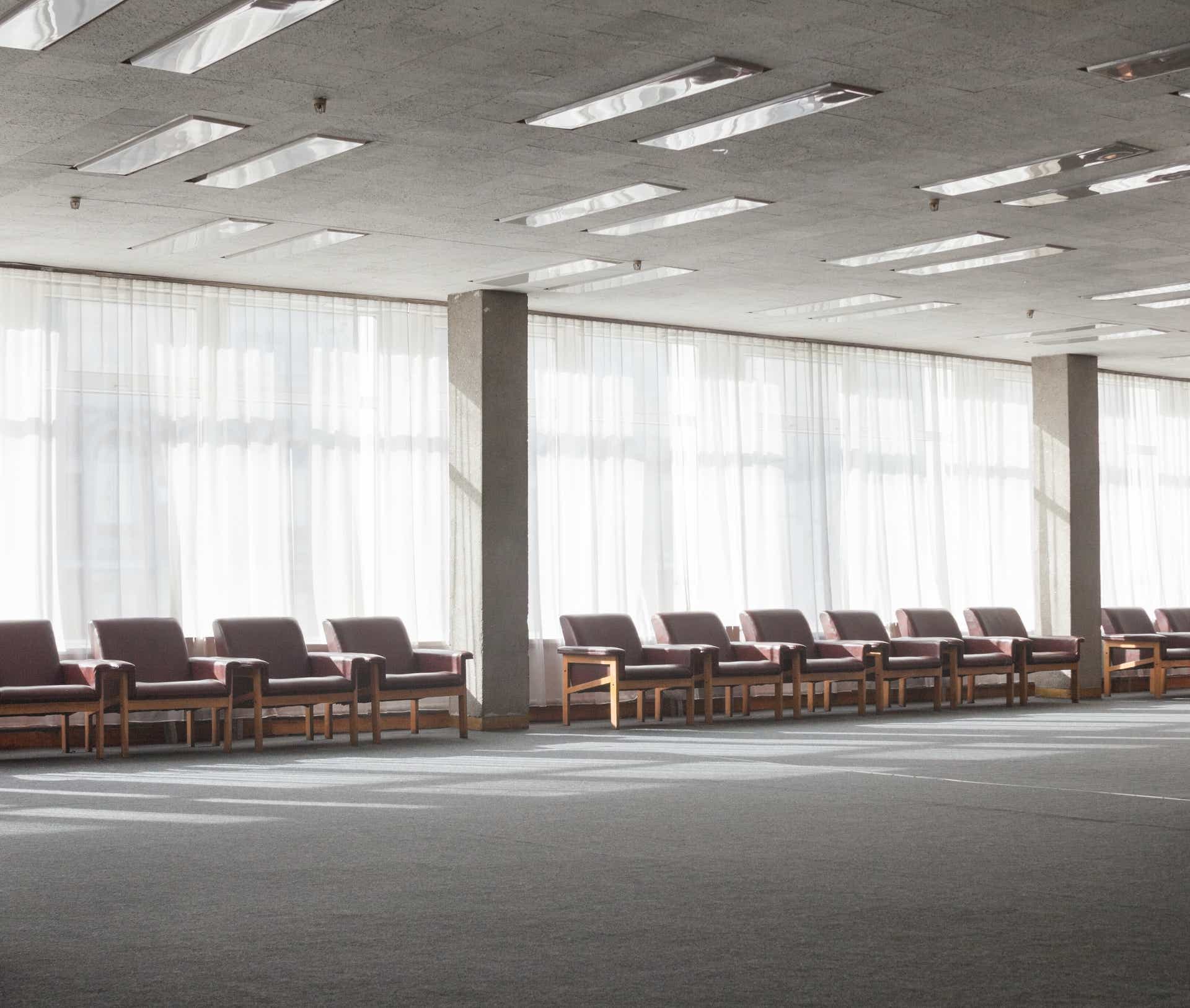 Office Space with Floor-to-Ceiling Drapes